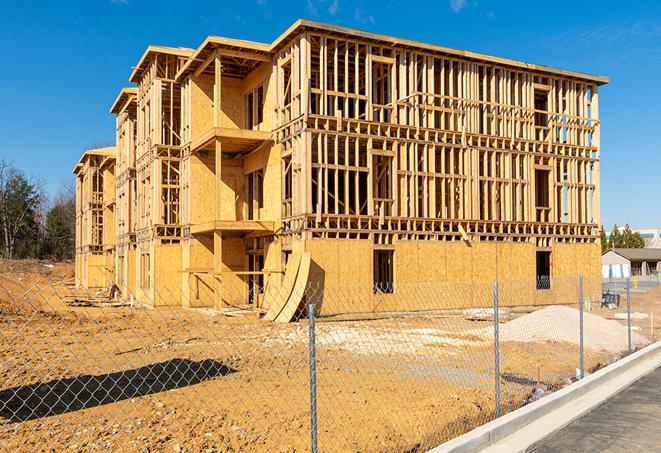 a snapshot of temporary chain link fences protecting a large construction project from unauthorized access in San Lorenzo, CA